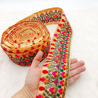 Peach Fabric Trim With Green, Fuchsia Pink, Red And Orange Embroidery and Gold Sequins